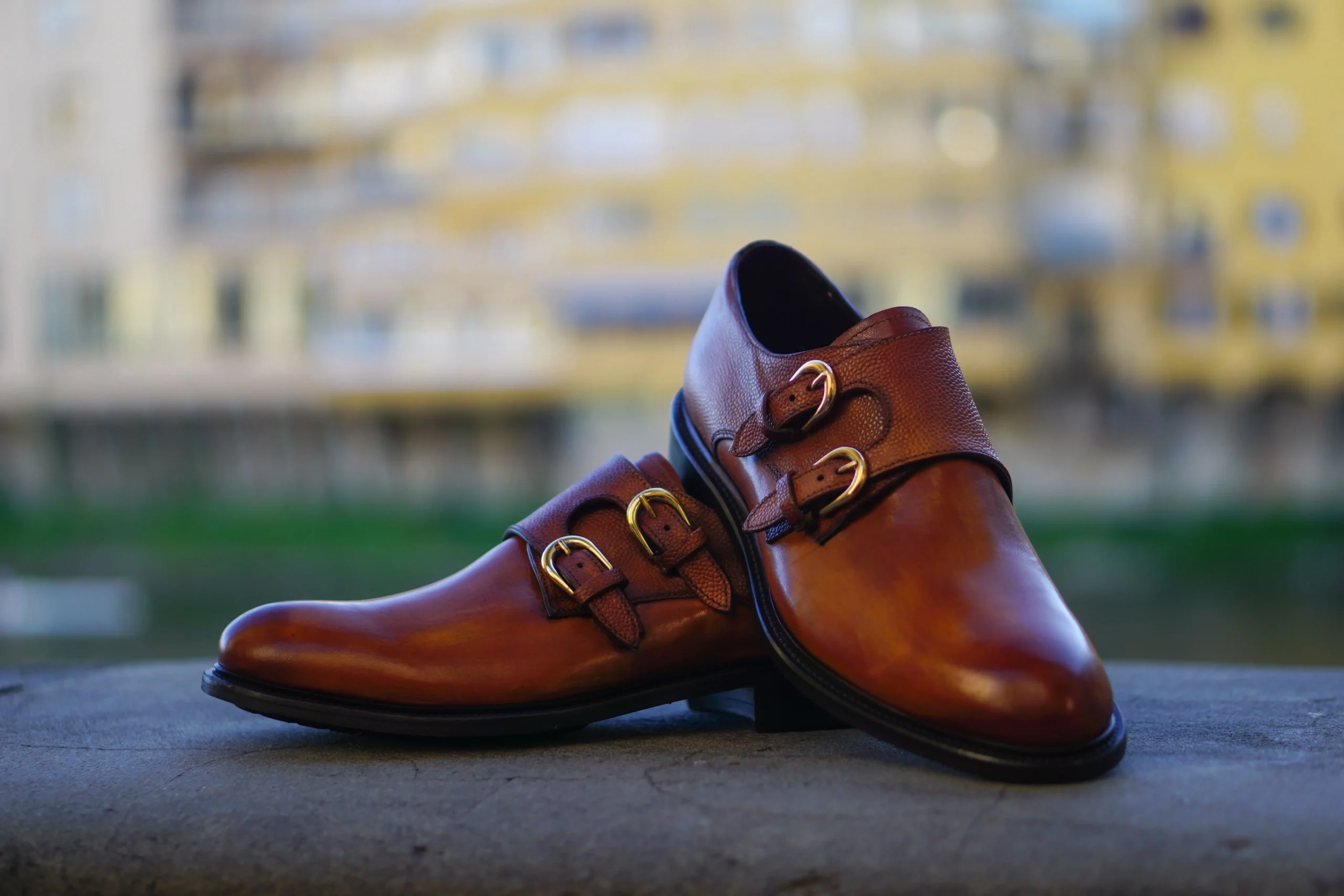 close-up-brown-shoes-retaining-wall-min